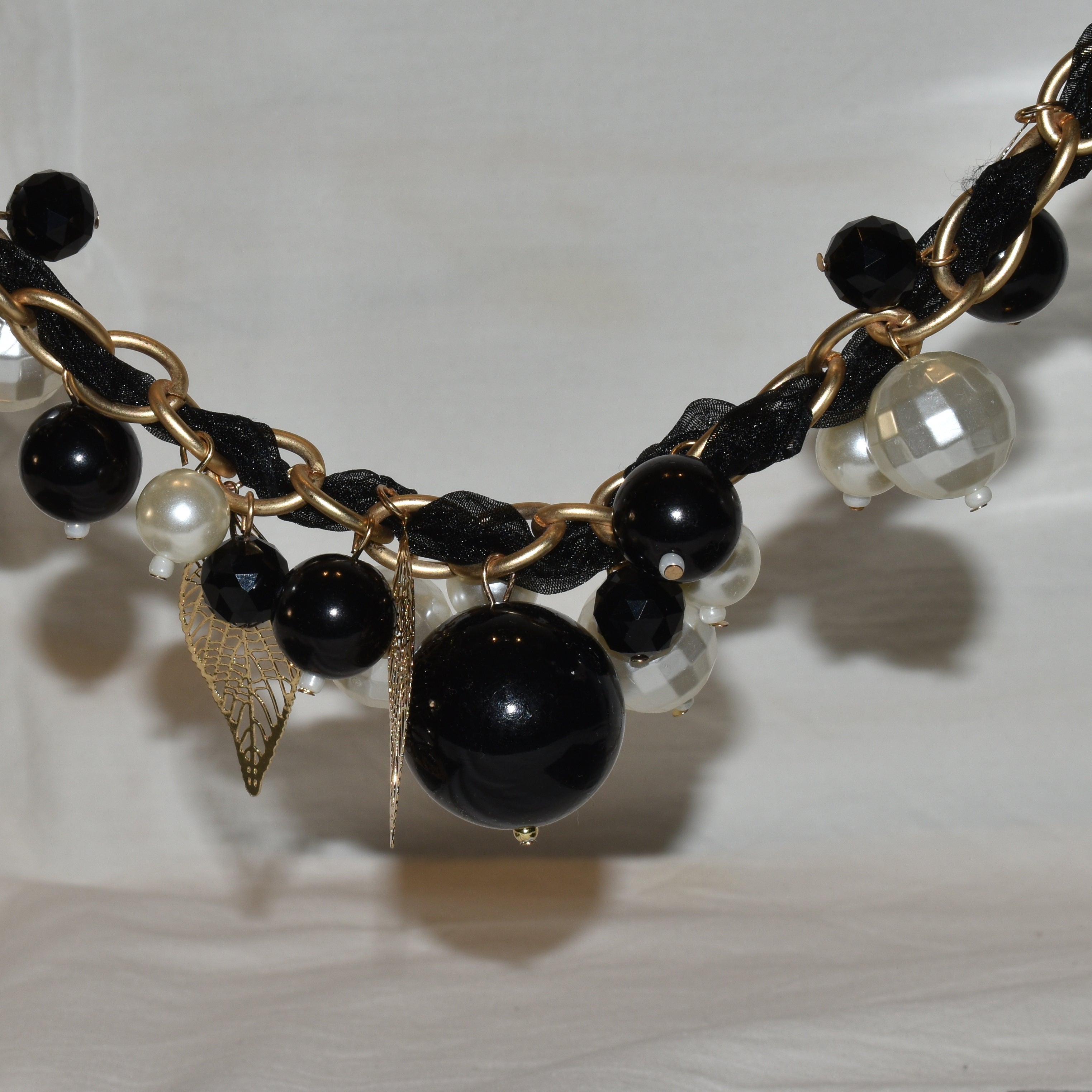 SONSI COLLANA NERA DORATA VARIE